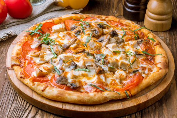 istock Pizza with chicken and mushrooms 1218097795