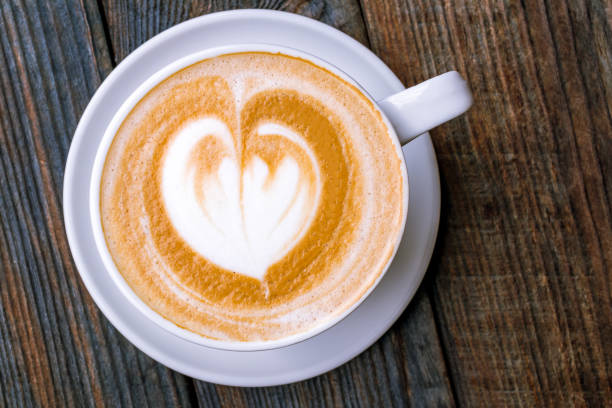istock Cappuccino coffee with heart drawing 1218099544