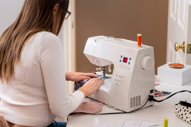 istock Young Woman Working From Home in her Sewing Business 1218101552