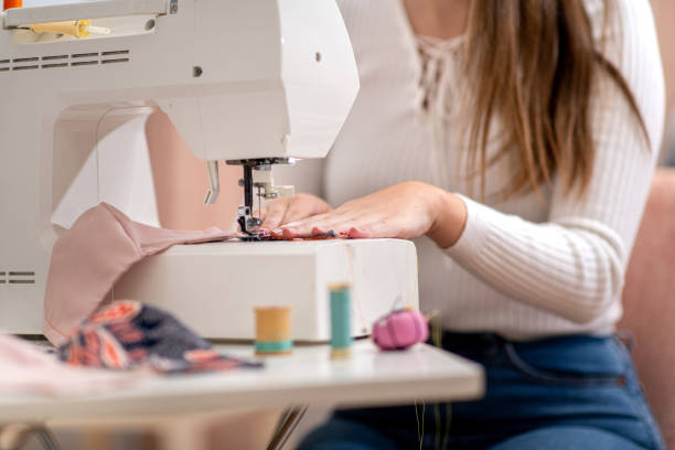 istock Young Woman Working From Home in her Sewing Business 1218101914