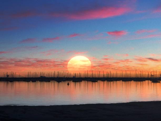 Free picture: Sunset over a lake harbor with silhouettes of small motor ...