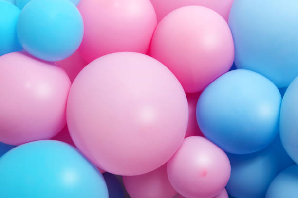 istock several pink and blue balloons forming a texture 1218110724