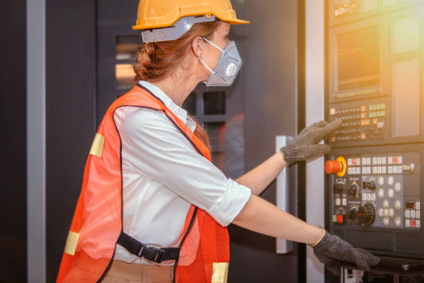 istock Young woman engineer in the mask protected herself with air pollution & virus 1218111475