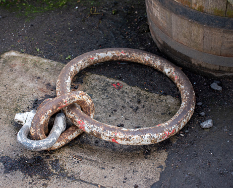 Old anchor ring, for tying boats. Fife, Scotland.