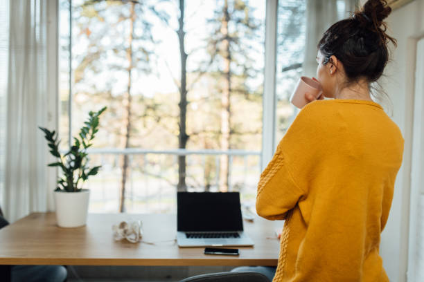 istock Young freelancer taking a break while working from home during COVID-19 pandemic 1218115761