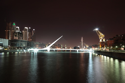 The Waterfront (Puerto Madero) with Women's Bridge (Puente de la Mujer) at night, in Buenos Aires, Argentina
