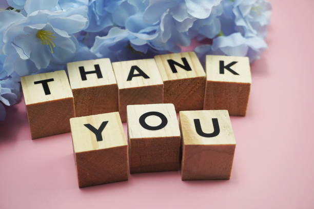 istock Thank You alphabet letters  with space copy on pink background 1218121709