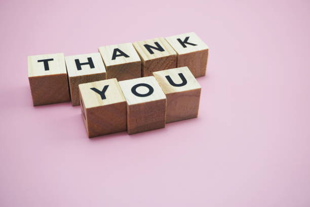 istock Thank You alphabet letters  with space copy on pink background 1218121727