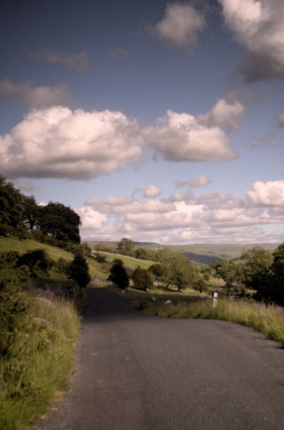 istock Single track road in North Yorkshire 1218122668