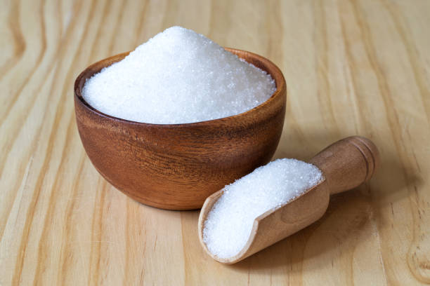 istock White sand sugar in wooden bowl 1218125157