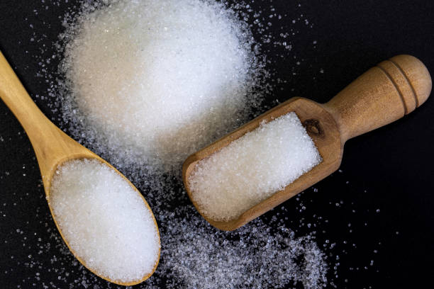 istock White sand sugar in wooden bowl 1218125158