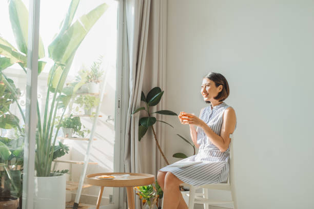 istock beautiful asian woman reading a book 1218125692