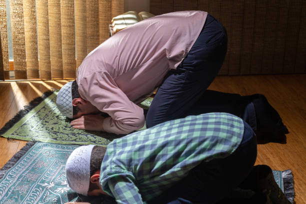 istock Family praying together in ramadan 1218130137