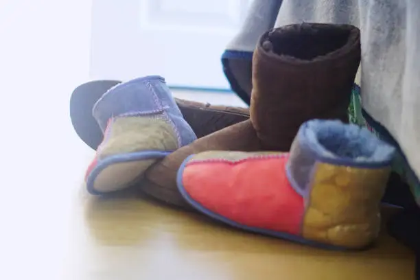 A couples ugg boots showing off the him and her collection