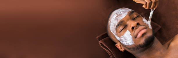istock Therapist Applying Face Mask To Man 1218132133