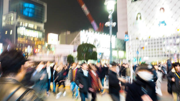 istock People traveling across the road blur focus 1218139089