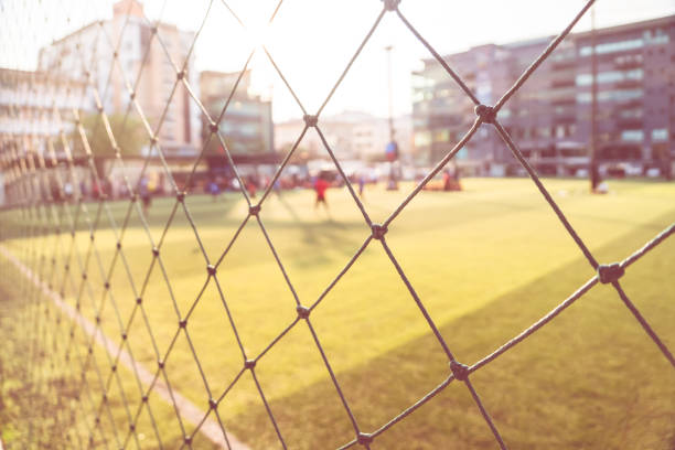 blurred outdoor soccer field for sport background abstract - soccer soccer field artificial turf man made material imagens e fotografias de stock