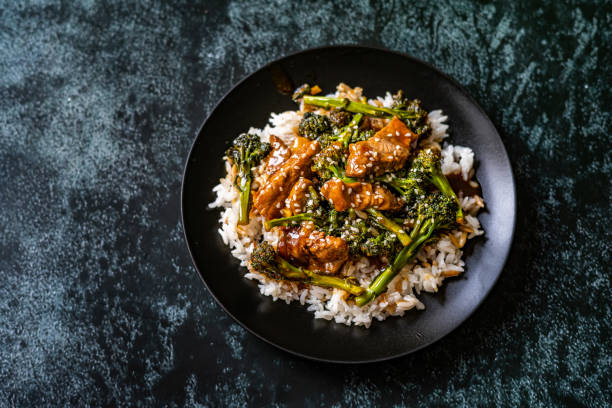 istock Delicious Asian Teriyaki Beef with Broccoli, Rice and Sesame Seeds. 1218146063