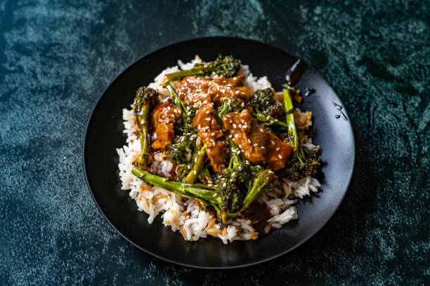 istock Delicious Asian Teriyaki Beef with Broccoli, Rice and Sesame Seeds. 1218146074
