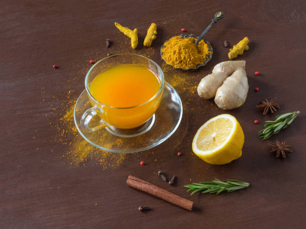 istock Herbal tea with turmeric, cinnamon,ginger, lemon and pepper 1218146080