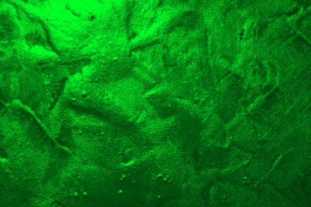 istock green creative painted textured stucco texture - pretty abstract photo background 1218148836