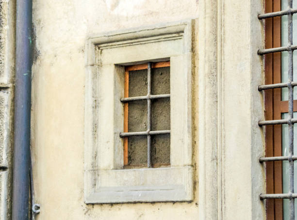 istock ancient window of historic building 1218149158