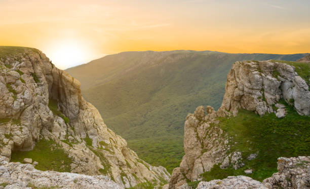 istock dramatic sunset over a top of mountain canyon 1218153534