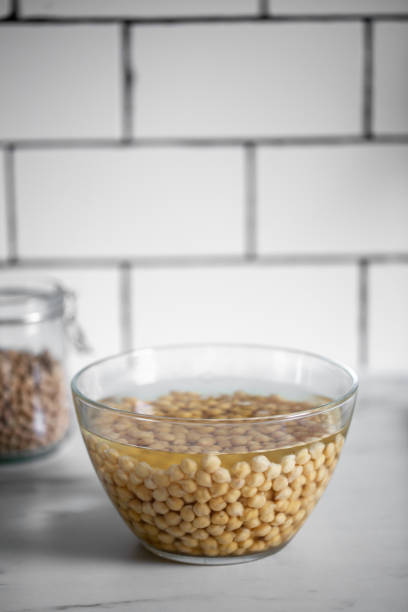 istock Heap of Chickpeas in water 1218155124
