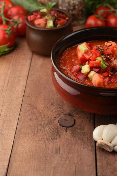 istock Traditional spanish cold gazpacho tomato soup on wood background 1218156496
