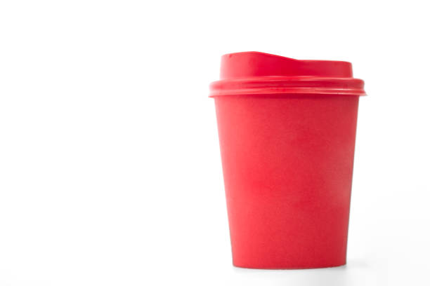 istock Red paper cup of coffee or tea on a white background 1218158615