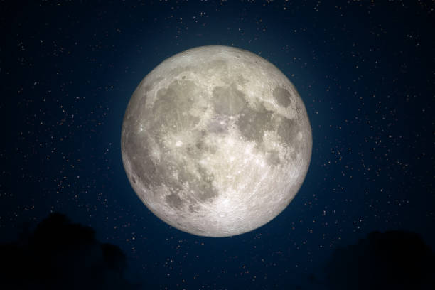 istock Full Moon in space with dark cloud in night sky. 1218162097