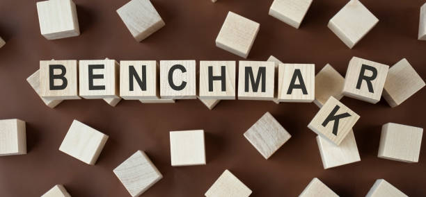 istock benchmark word on cubes on wooden background 1218163265