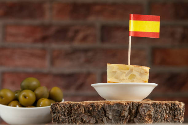 istock Spanish omelette brochette and olives bowl from below 1218163947