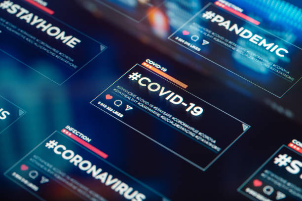 istock #COVID-19 hashtag for social networks close-up on digital display 1218165280