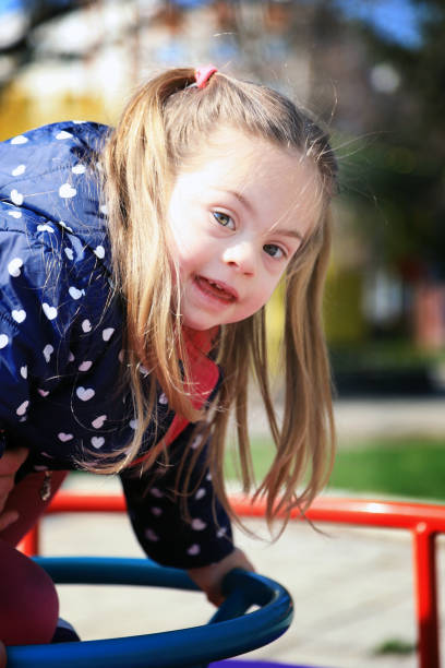 istock Little girl having fun in a playground 1218167610