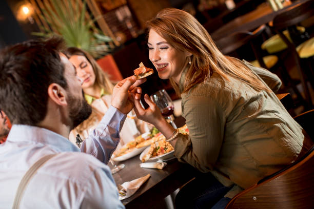 istock Young people having dinner in the restaurant 1218168042