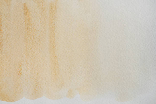 istock Abstract background by hand drawn brown with orange color liquid drip 1218169043