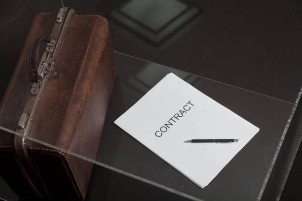istock Contract and leather carpetbag close-up 1218169374