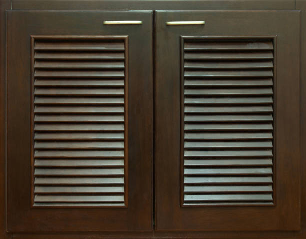 istock Dark Wooden Cabinet Doors Background 1218169461