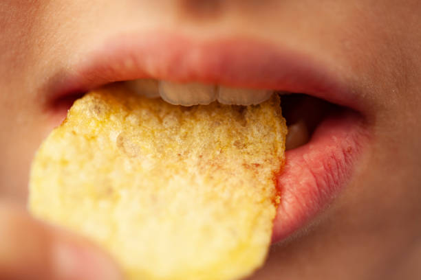 girl eating potato chips girl eating potato chips
macro shooting prison meal stock pictures, royalty-free photos & images