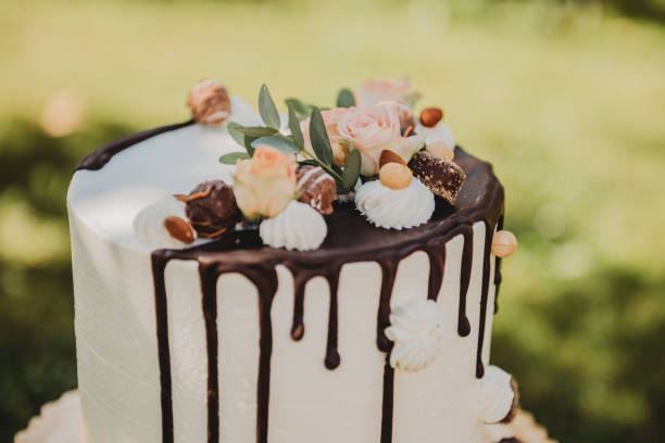 young woman holding birthday wedding cake