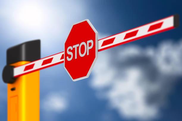 istock closed automatic barrier on white background. Isolated 3D illustration 1218180083