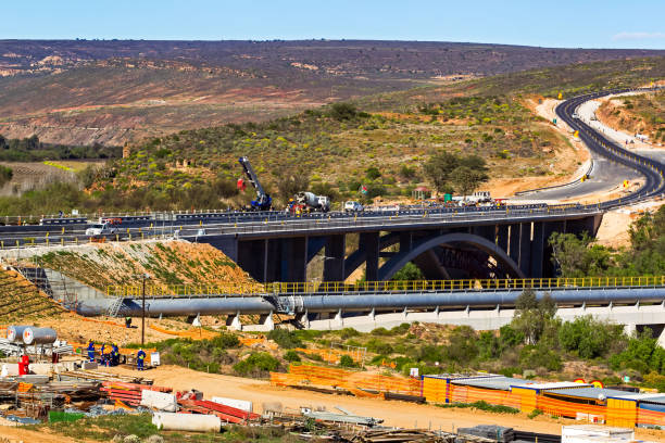 Highway bridge under construction Concrete highway bridge under construction over Oliphants River valley, in Cederberg Region, Western Cape, South Africa cederberg mountains photos stock pictures, royalty-free photos & images