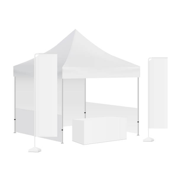 Trade show booth display stand - tent canopy, rectangular flags and demonstration table Trade show booth display stand - tent canopy, rectangular flags and demonstration table. Vector illustration feather flag stock illustrations