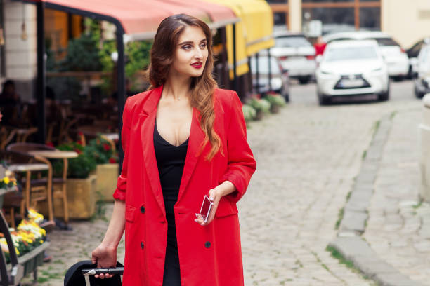 istock Woman walks down street. 1218185538