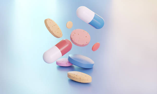 drugs and vitamin supplements fell on the floor. medical background - antibiotic red medicine healthcare and medicine imagens e fotografias de stock