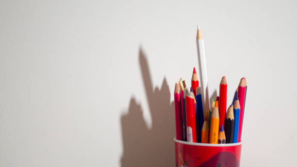 istock colored pencils on a white background. Back to school. School background with space for your text 1218187065