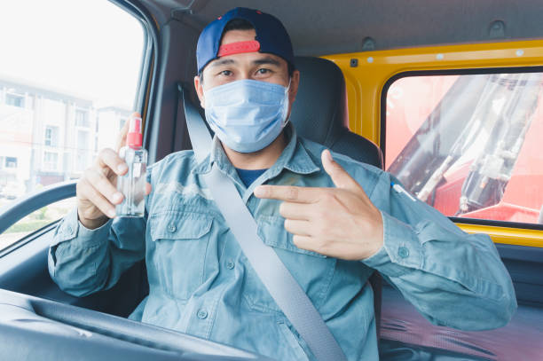 istock Truck driver wearing a mask 1218187423