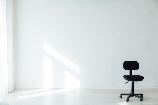 black office chair in the interior of the white office