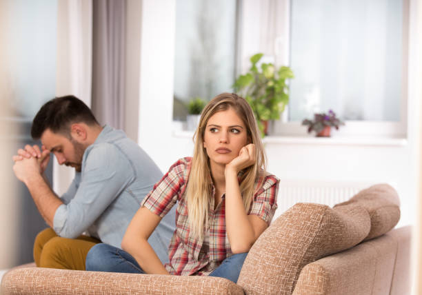 istock Young couple having fight at home 1218187807